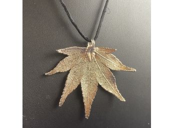 Sterling Silver Dipped Leaf Pendant On A Black Satin String With Silver Fittings, 16'