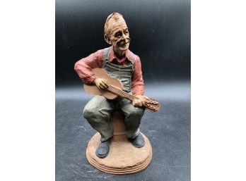 Town And Country Sculptures In Plaster :  Man Playing A Guitar
