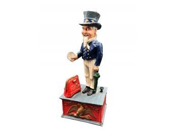 Mobile Uncle Sam Depositing Coin Into Carpetbag Savings Bank Made In Cast Iron