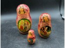 Lot 2 Of Hand-painted Wooden Nesting Dolls