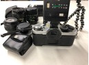 Canon 35MM   AE-1 Camera Kit With Flash Unit, Additional  Lenses And Filters