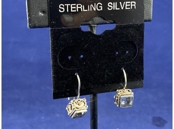 Sterling Silver With Light Blue Topaz Earrings
