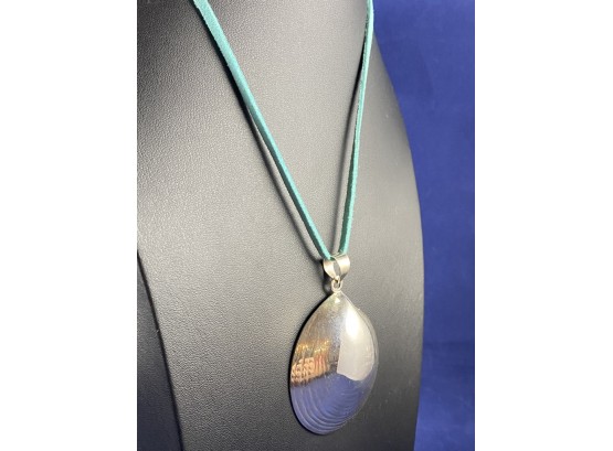 Sterling Silver Shell Pendant On Sea Green Suede Cord With Sterling Fittings