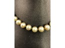 8mm Champaign Pearl Necklace 15' Steling Silver Clasp And Safety