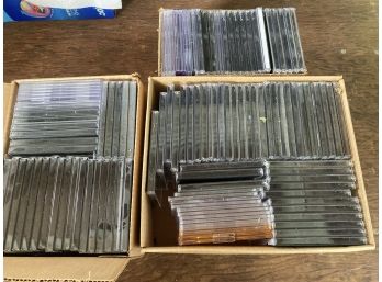3 Boxes Of CD Cases - Over 50 Cases In VG Condition