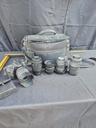 Large Lot Of Cameras And Lenses And Camera Bag