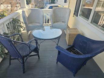 All Of The Outdoor Wicker Seating, Rockers And Table Seen Here