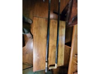 Pair Of Walking Sticks (one With Sword)