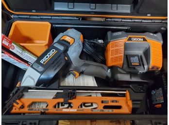Battery Operated Ridgid Nail Gun, 15 Gauge, Battery Charger And Case Included, 18 Volt, Used Only Once
