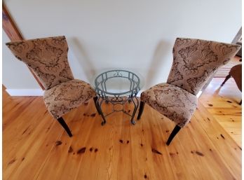 Pair Of Chairs With Glass Top Coffee Table Over Iron Base