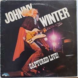 1ST YEAR 1976 RELEASE JOHNNY WINTER-CAPTURED LIVE VINYL RECORD PZ 33944 BLUE SKY RECORDS