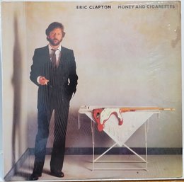 1983 RELEASE ERIC CLAPTON-MONEY AND CIGARETTES VINYL RECORD 1-23773 DUCK RECORDS.-
