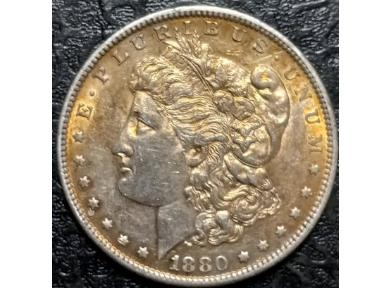 GOLDEN TONED UNCIRCULATED 1880-S MINT MORGAN SIVER DOLLAR