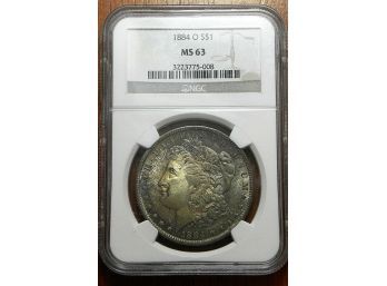 1884-O Morgan Silver Dollar NGC MS-63. Deep Rich Toning With Color
