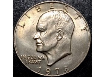 1978 EISENHOWER DOLLAR MS-62 QUALITY LIGHT PINK AND YELLOW TONING WITH GREAT EYE APPEAL