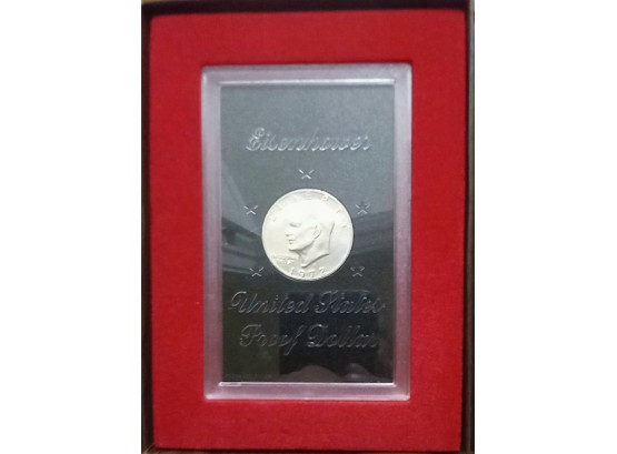 1972-S 40 PERCENT SILVER EISENHOWER PROOF DOLLAR IN ORIGINAL MINT CASE AND BROWN BOX. LIGHT BLUE TONING