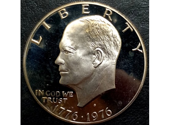 1976-S CLAD EISENHOWER DOLLAR GEM CAMEO PROOF. A BIT OF COLOR ON REVERSE. TOTAL WEIGHT OF COIN IS 22.70 GRAMS