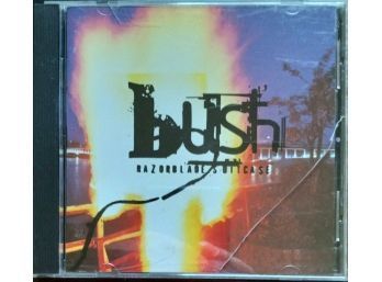 BUSH/RAZORBLADE SUITCASE CD VERY LIGHT SCUFF MARKS