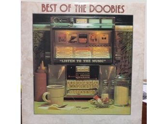 THE DOOBIE BROTHERS/THE BEST OF THE DOOBIES VINYL RECORD. BS 2978 1972-1976 WARNER BROS RECORDINGS