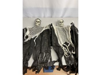 Pair Of Hanging Skeletons