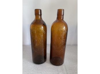 Pair Of Antique Duffy Malt Whiskey Company Bottles