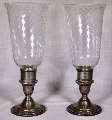 PAIR OF MID-CENTURY INTERNATIONAL WILD ROSE STERLING SILVER CANDLEHOLDERS