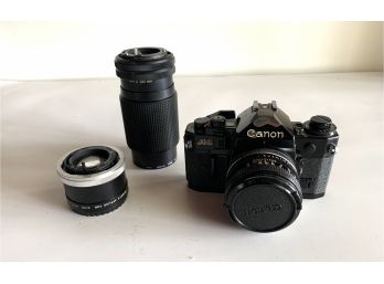 Canon A-1 50mm F/1.8 Lens With Case And Vivitar 70-150mm F/3.8 Lens1