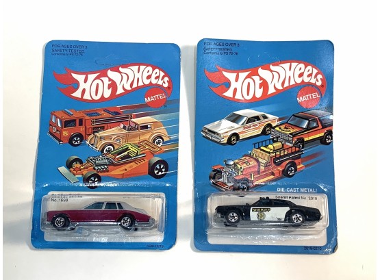 2 Hot Wheels - Cadillac Seville No. 1698 And Sheriff Patrol No. 2019.  Both In Unpunched Blister Packs.