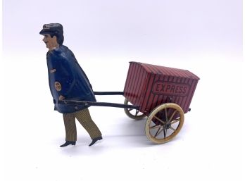 Antique Tin Wind-up Toy, Man Pulling Express Wagon