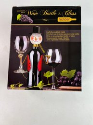 Snowman Metal Wine Bottle And Glass Holder