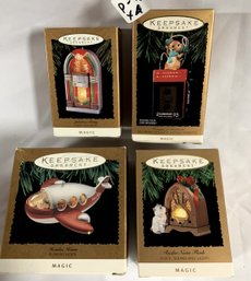 (4) Assorted Hallmark Magic Ornaments