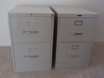 Two Metal Filing Cabinets