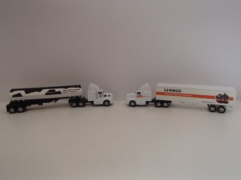 Two Maisto Toy Semi Trucks