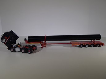 WSI Models Mammoet Man TGX 6x2 Twin Steer Truck With 4 Axle Extending Lowboy Trailer And Pipe