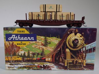 Athearn HO Scale 40ft. Flat With Stakes Model Railcar And Units Of Lumber