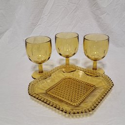 Three Amber Glass Goblets And Amber Glass Tray In Adam's Wildflower Pattern