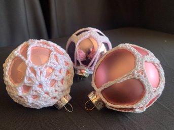 Three Pink Crocheted Christmas Bulbs Ornaments,  One Is More Mirrored And One Has A More Frosted Finish