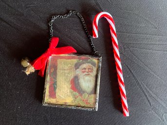 Decorative Vintage Santa Ornament In Faux Glass Frame With Faux Candy Cane Hanger