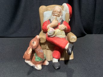 Santa In A Comfy Chair Decorative Music Box  PLAYS WE WISH YOU MERRY CHRISTMAS  BABY REINDEER