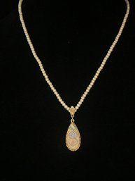 Lovely Vintage Gold Tone 1928 Jewelry Necklace With Faux Pearls And Floral Pendant