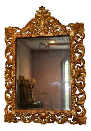 Large Heavily Gilded Antique Peaked Mirror