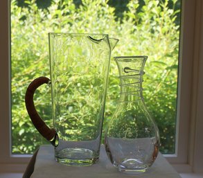 A Tall Handled Pitcher And A Simon Pierce Decanter