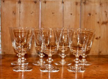 Six Crystal Glasses With One Extra