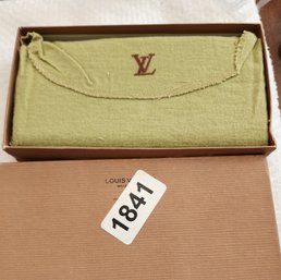 THIS IS AN AUTHENTIC KNOCK OFF FAKE LOUIS VUITTON WALLET NIB