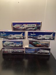 7 Hess Trucks  New In Boxes