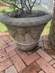 One Cement Planter With A Face And Flower And Fruit