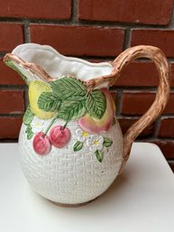 Porcelain Pitcher With Fruit On It