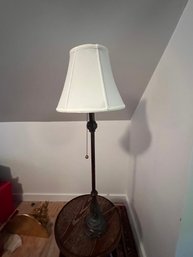 One Tall Metal Lamp With Shade
