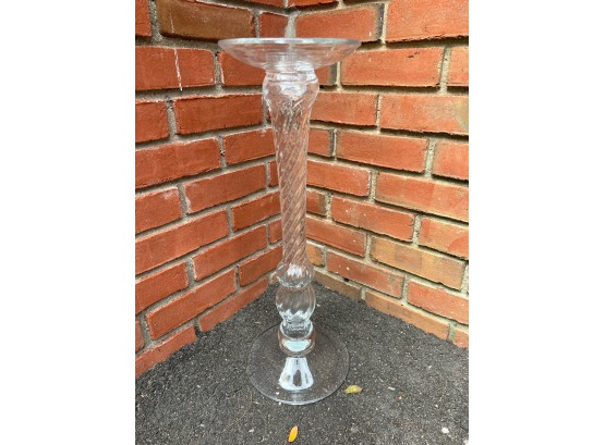 One Tall Glass Candle Holder With Green Candles