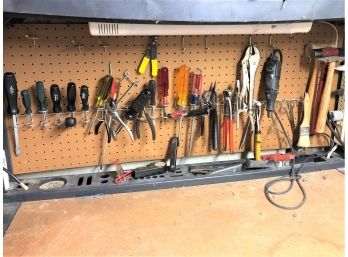 Entire Back Peg Board Of Tools & Accessories